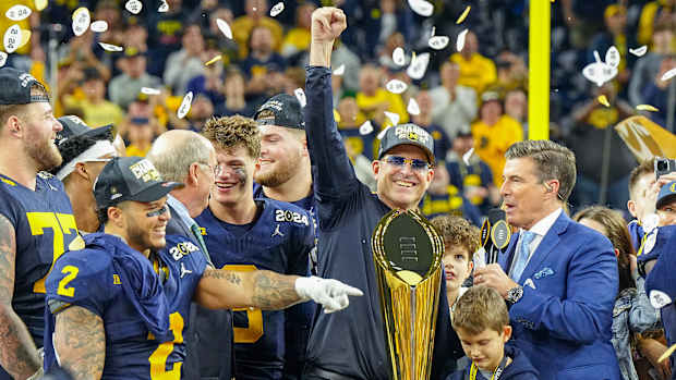 Harbaugh led Michigan to a national championship before leaving for the NFL.